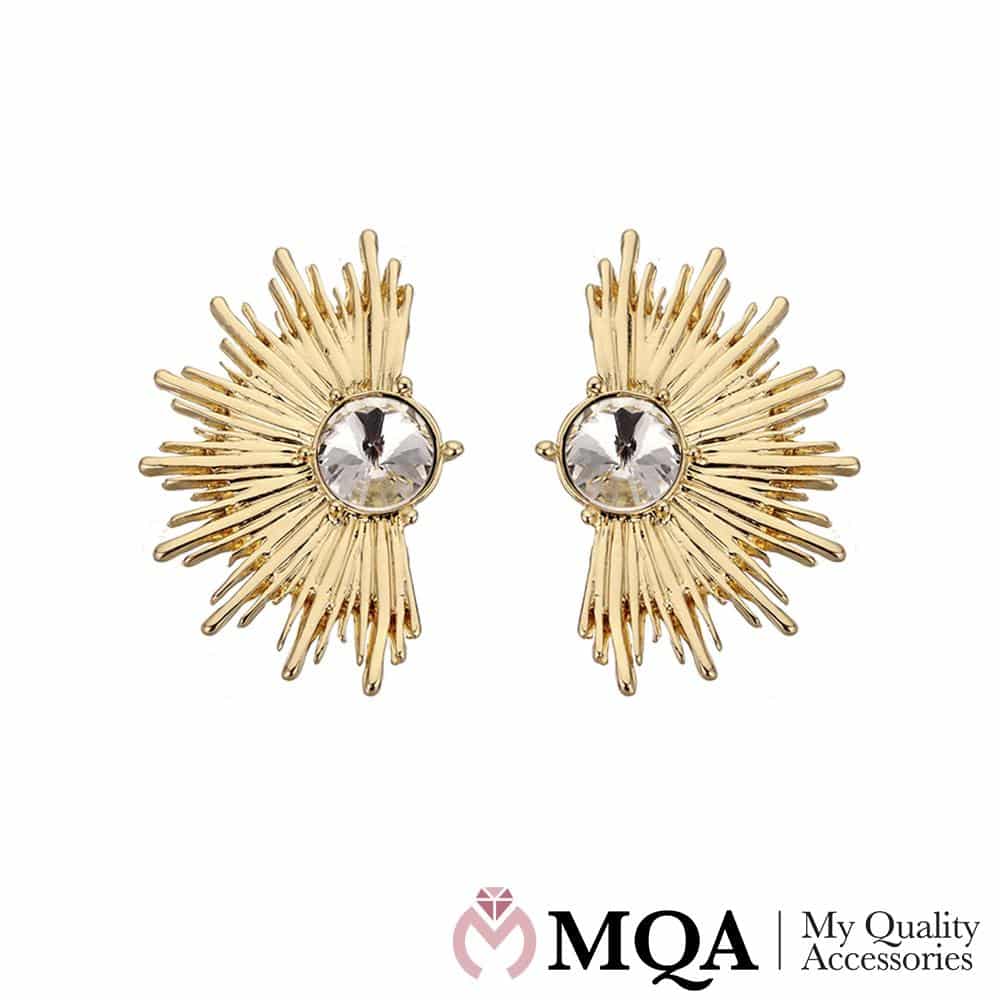 Øredobber med solstråler og stor sten